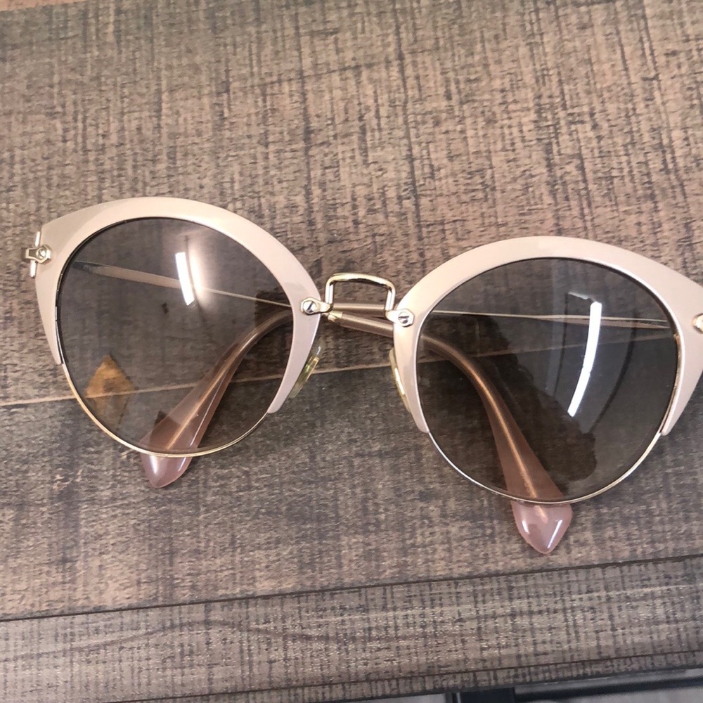 Miu Miu sunglasses, champagne and gold frame.